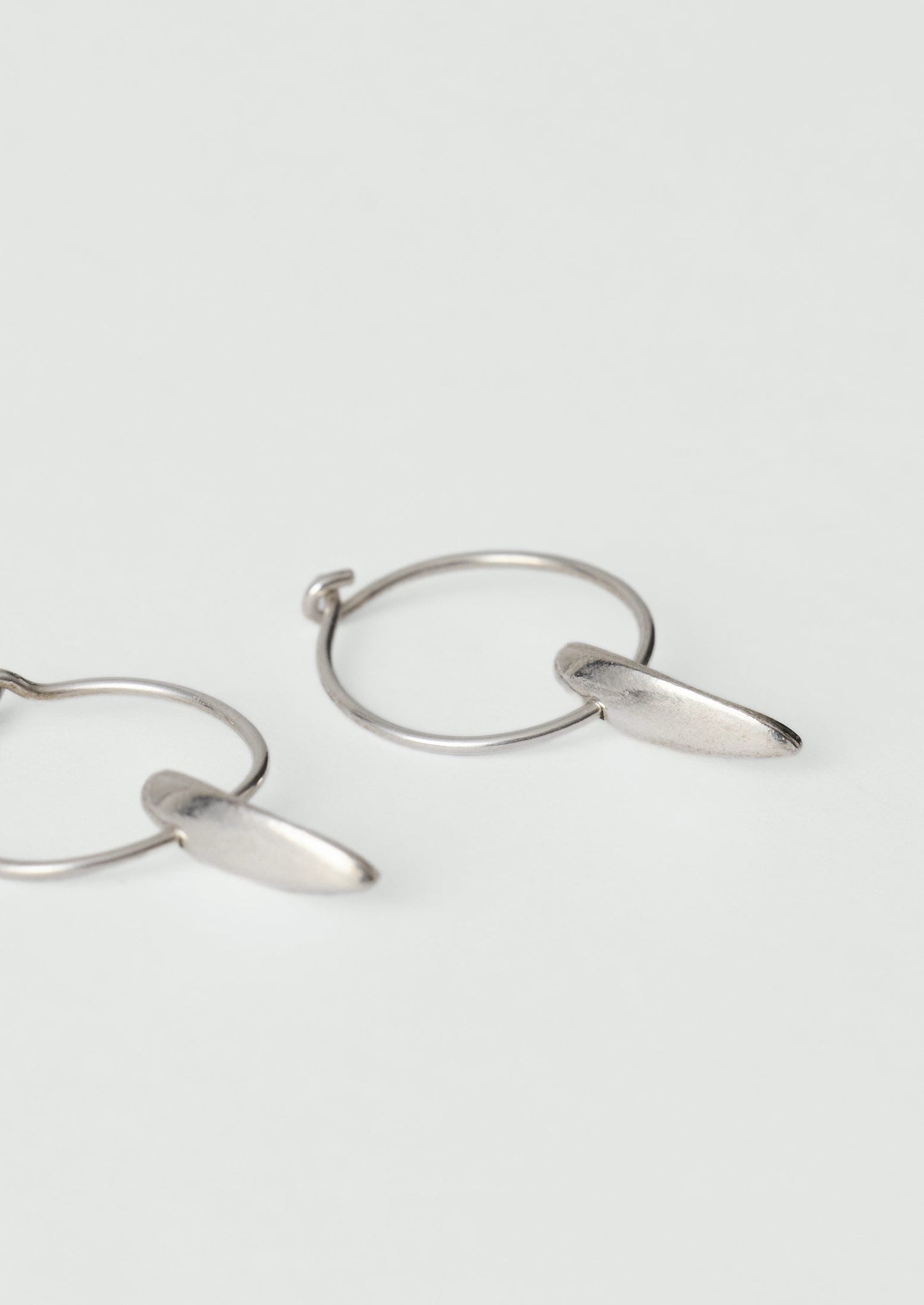 Sally Lacock Sculpted Seed Charm Hoops | Silver