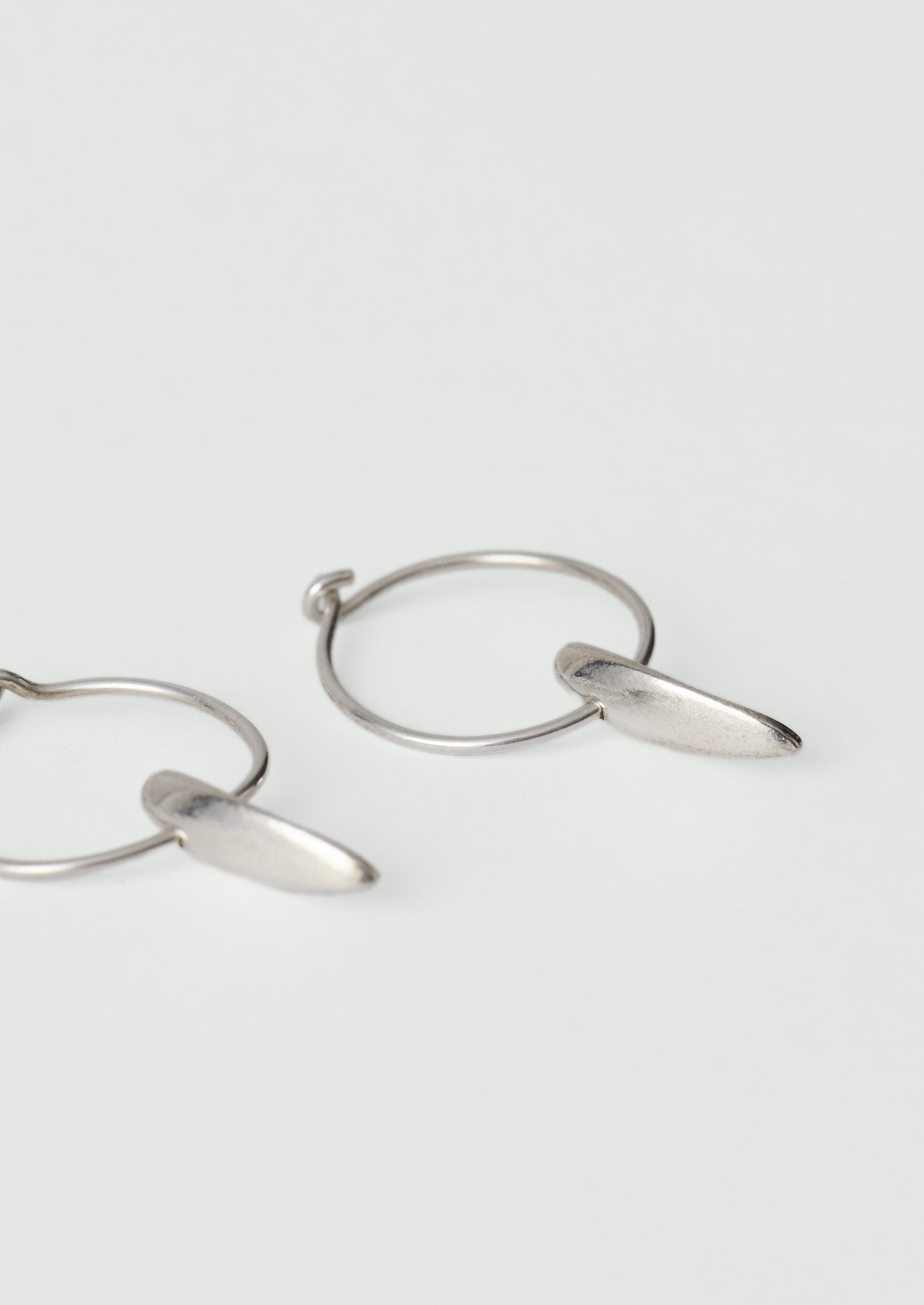 Sally Lacock Sculpted Seed Charm Hoops | Silver